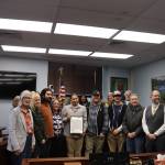 X̱unei Lance Twitchell poses with supporters and colleagues for a group photo at a legislative citation ceremony at the Alaska State Capitol on Saturday, June 28, 2025. (Ellie Ruel / Juneau Empire)