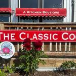 Peonies are in bloom on Friday, July 4, 2025, in front of The Classic Cook on Pioneer Avenue in Homer, Alaska, just in time for the start of the sixth annual Peony Celebration. Photo by Christina Whiting
