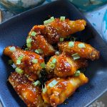 These chicken wings are sweet, mildly spicy, and fragrant with fresh ginger and garlic. (Photo by Tressa Dale/Peninsula Clarion)