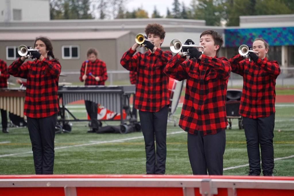 The Kenai Marching Band performs during the Second Annual Kenai Marching Showcase at Kenai Central High School in Kenai, Alaska. (Jake Dye/Peninsula Clarion)