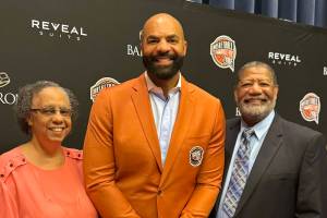 Renee Boozer, Carlos Boozer Jr. and Carlos Boozer Sr. attend the enshrinement ceremony at the Naismith Basketball Hall of Fame in Sprinfield, Massachusetts, on Saturday, Sept. 6, 2025. As a member of the 2008 U.S. men's Olympic team, Boozer Jr. is a member of the 2025 class. (Photo provided by Carlos Boozer Sr.)