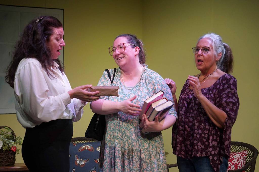 Amy Burton, Heidi Hinz and Yvette Tappana rehearse Savannah Sipping Society at the Kenai Performers Theater near Soldotna, Alaska, on Saturday, Sept. 13, 2025. (Jake Dye/Peninsula Clarion)