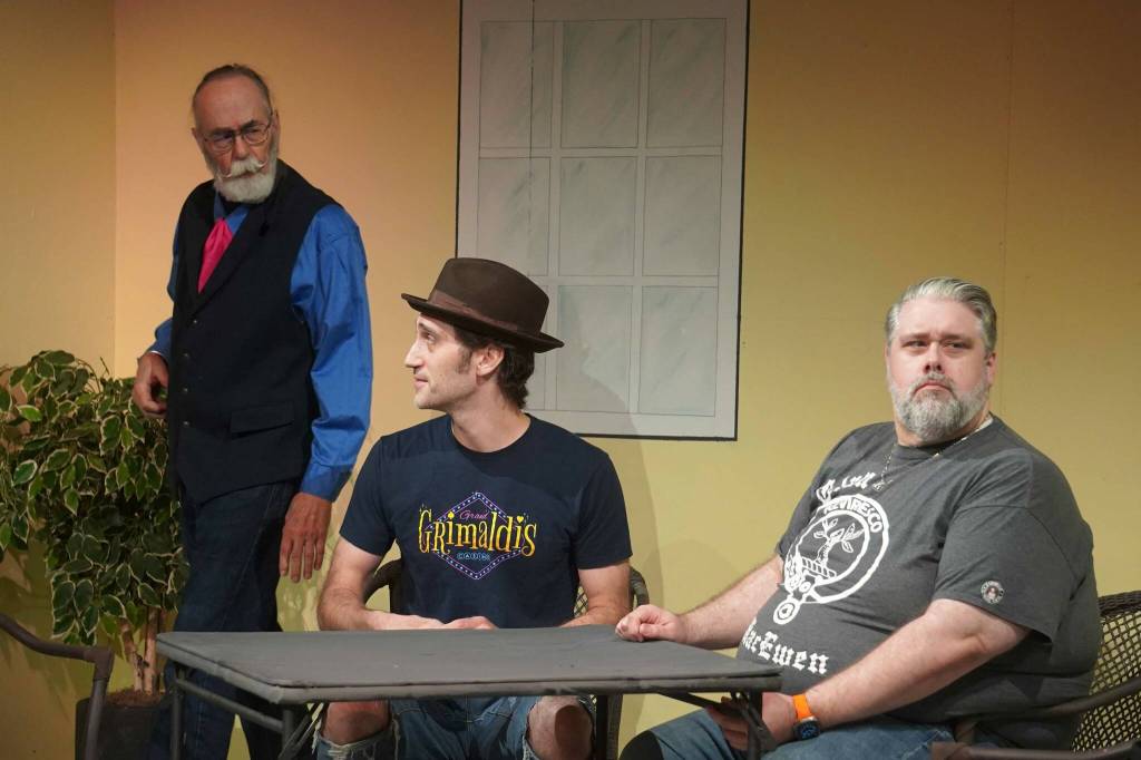 Allen Auxier, Tony Mika and Ian McEwen rehearse If Men Played Cards as Women Do at the Kenai Performers Theater near Soldotna, Alaska, on Saturday, Sept. 13, 2025. (Jake Dye/Peninsula Clarion)