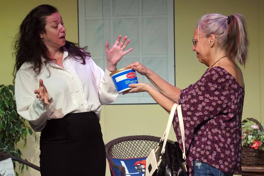 Amy Burton and Yvette Tappana rehearse Savannah Sipping Society at the Kenai Performers Theater near Soldotna, Alaska, on Saturday, Sept. 13, 2025. (Jake Dye/Peninsula Clarion)