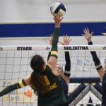 Sewards Mikinley Williams attacks against Soldotnas Teagen Kobylarz and Ashlyn Hall on Thursday, Sept. 18, 2025, at Soldotna High School in Soldotna, Alaska. (Photo by Jeff Helminiak/Peninsula Clarion)
