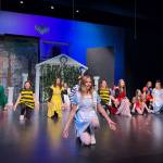 Photo courtesy of Carla Jenness
Julia Peterkin, an eighth grader playing Alice in Nikiski Middle Schools upcoming performance of Alice in Wonderland, is pictured in front of the rest of the cast on Dec. 2.