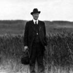 Image from the Rasmuson Library historical archives at the University of Alaska Fairbanks
Prof. C.C. Georgeson poses while inspecting one of his Alaskan agricultural experiment stations in the early 1900s.