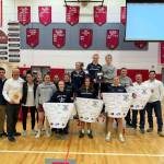 The Soldotna High School girls wrestling team is photographed after the Northern Lights Conference in Wasilla<ins>, Alaska</ins> on Saturday, Dec. 13<ins>, 2025</ins>. SoHi sent 11 girls to regionals, and nine will compete in the state tournament at the Alaska Airlines Center this weekend in Anchorage. Photo courtesy of Soldotna High School Athletics