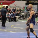 Senior Mason Bock exclaims after winning the state title during the ASAA Division I state championships in Anchorage, Alaska on Dec. 20, 2025. Bock beat No. 2 seed Isaiah Schultz of Colony High School in the final, securing his victory in the 135-pound title as the No. 4 seed. Bock said standing on the podium was the best moment of his life, telling the Clarion that since he had lost to Schultz once earlier in the season, he was “focused and determined to have a different outcome” during the final match. Photo courtesy of Andie Bock/Andie’s Alaskan Adventures Photography