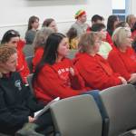 Dozens of supporters of Sterling Elementary School fill the assembly chambers during a special meeting of the Kenai Peninsula Borough School District Board of Education in Soldotna, Alaska, on Wednesday, April 23, 2025. (Jake Dye/Peninsula Clarion)