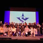 The Soldotna High School varsity football team receives certificates of achievement, presented on Tuesday, Jan. 13, 2026, by Kenai Peninsula Borough Mayor Peter Micciche (right) and KPB Assembly member Sargeant Truesdell, for winning the Division II State Championship in October 2025. Photo courtesy Joe Rizzo