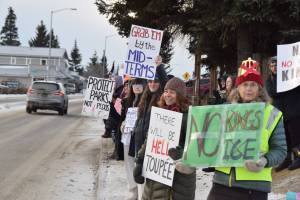 Delcenia Cosman / Homer News
Demonstrators gather at WKFL Park in Homer<ins>, Alaska</ins> on Saturday, Jan. 24<ins>, 2026</ins>, for the No Kings, No ICE protest organized by the Homer Women of Action.