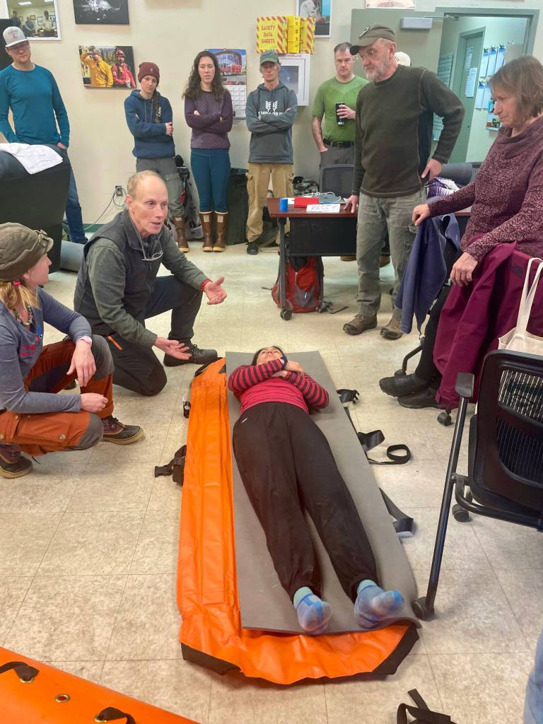 Members of the Kachemak Bay Search and Rescue group receive first aid instruction from MAT+SAR Search and Rescues Mark Stigar (center left) on Jan. 31, 2026, during a training weekend at Kachemak Emergency Services station in Homer, Alaska. Photo courtesy Kasey Aderhold