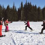 Delcenia Cosman/Homer News
Anchor Point youth run a relay during the Snow Rondi kids snowshoe races on Saturday, March 2, 2024 at Fireweed Meadows golf course in Anchor Point<ins>, Alaska</ins>.